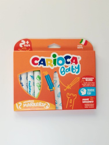 przód-pomarańczowego-tekturowego-pudełka-carioca-baby-w-wyciętym-okienku-widać-mazaki-dla-dzieci-od-2-roku-życia.jpg